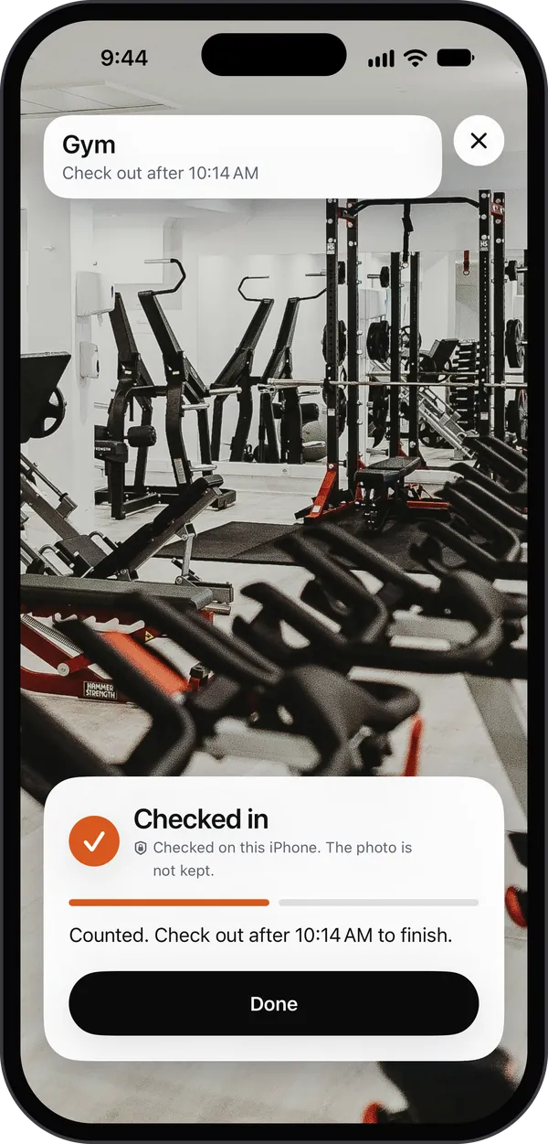 Toll's camera in the same gym: a photo of a power rack over a row of spin bikes, Checked in, checked on this iPhone, the photo not kept. Counted. Check out after 10:14 AM to finish.